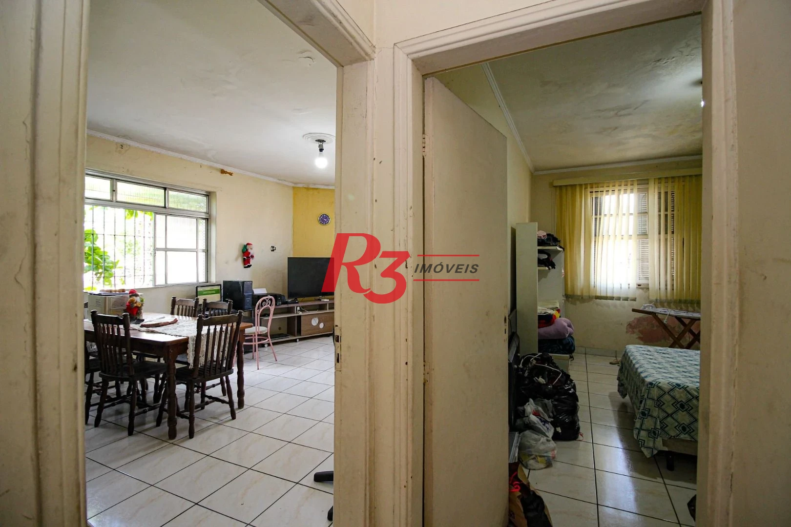 Casa sobreposta alta, à venda, 150 m², Santos SP