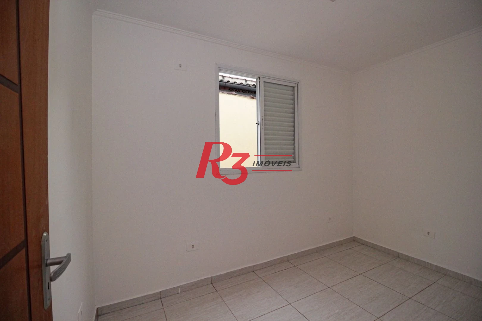 Casa com 3 dormitórios à venda, 75 m² por R$ 500.000,00 - Marapé - Santos/SP