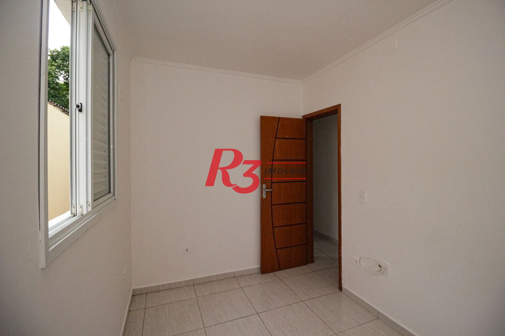 Casa com 3 dormitórios à venda, 75 m² por R$ 500.000,00 - Marapé - Santos/SP