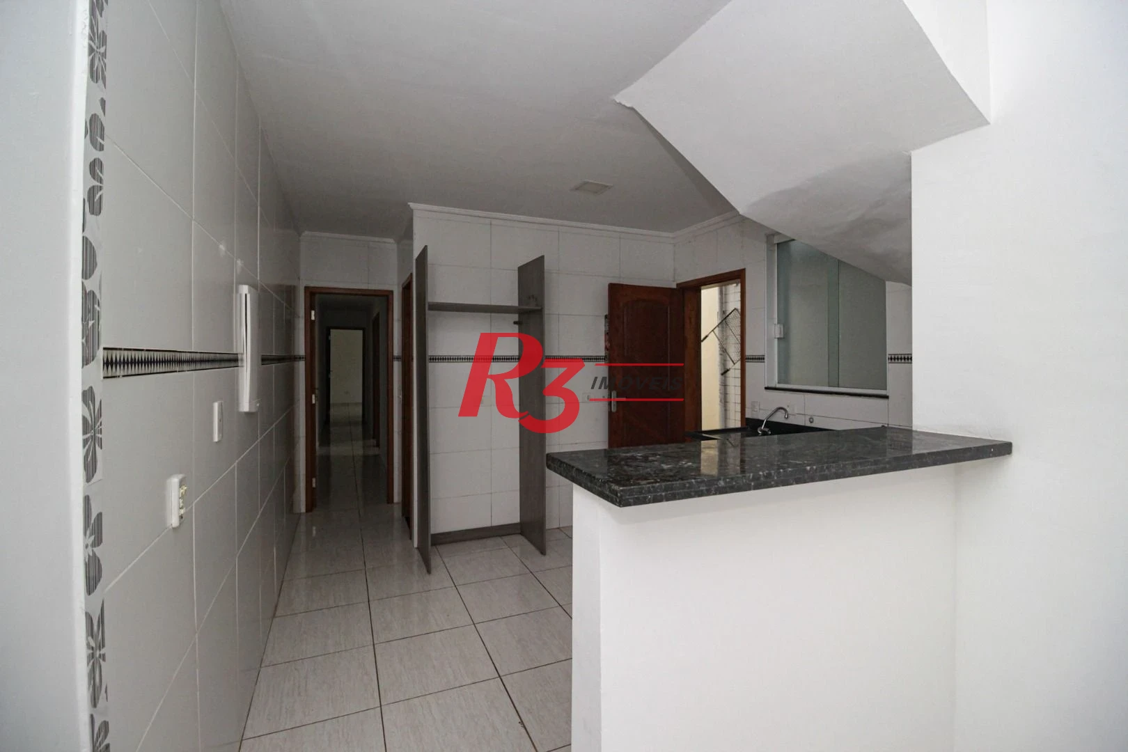Casa com 3 dormitórios à venda, 75 m² por R$ 500.000,00 - Marapé - Santos/SP
