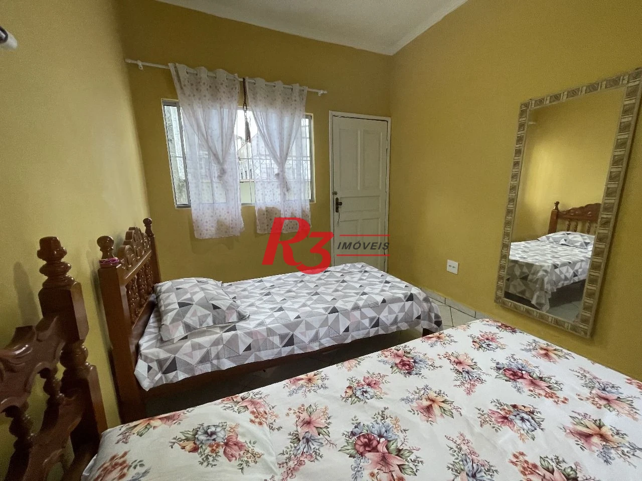Casa à venda, 240 m² por R$ 500.000,00 - Caneleira - Santos/SP