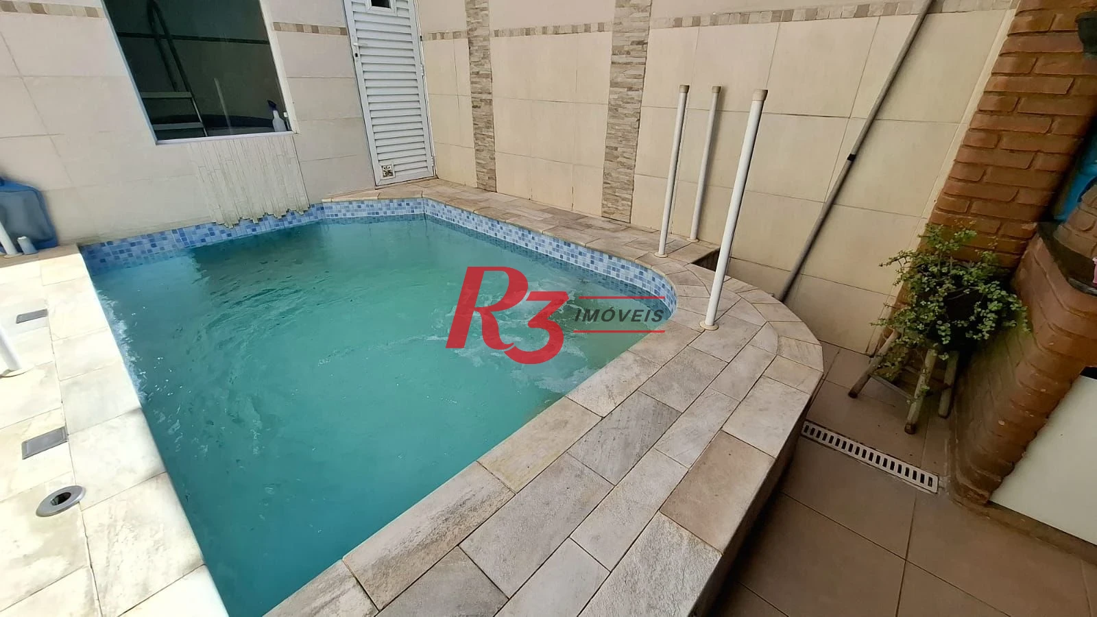 Casa com 3 dormitórios à venda, 317 m² por R$ 1.600.000,00 - Ponta da Praia - Santos/SP