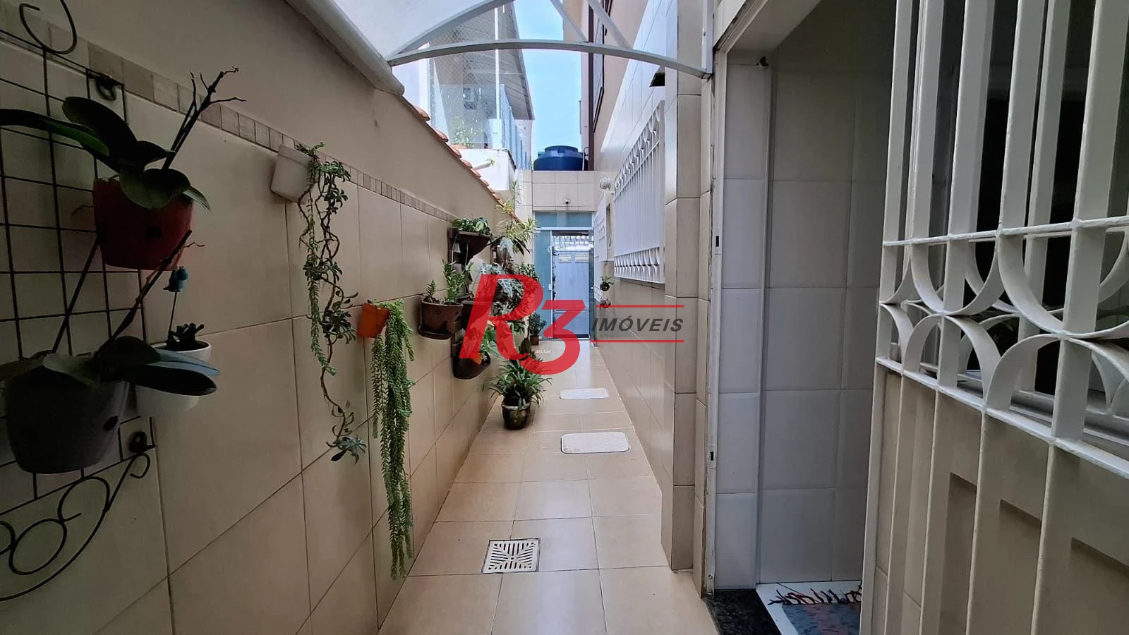 Casa com 3 dormitórios à venda, 317 m² por R$ 1.600.000,00 - Ponta da Praia - Santos/SP