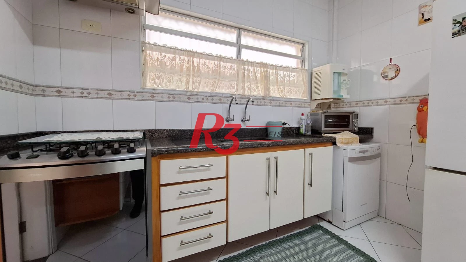 Casa com 3 dormitórios à venda, 317 m² por R$ 1.600.000,00 - Ponta da Praia - Santos/SP
