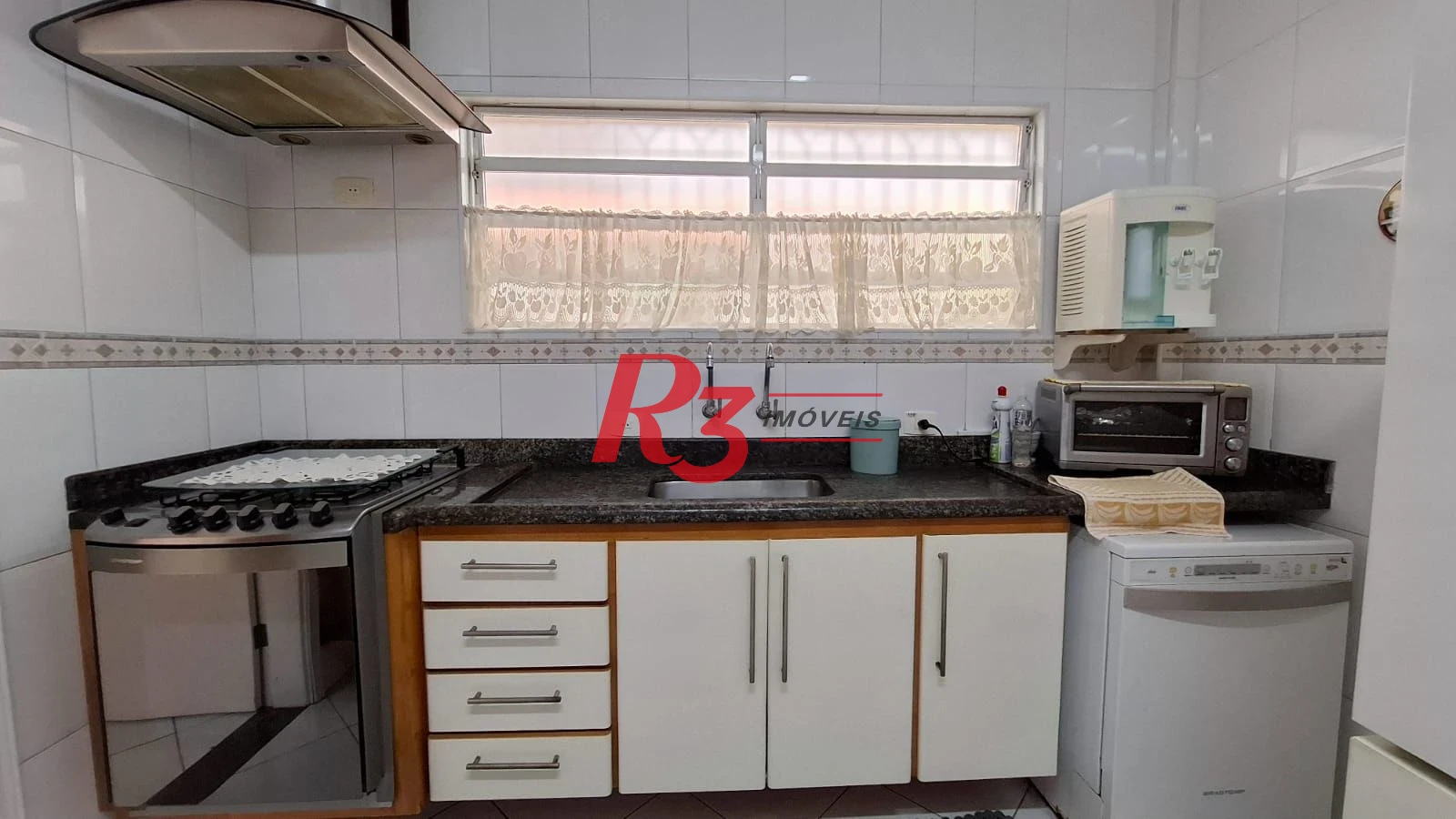Casa com 3 dormitórios à venda, 317 m² por R$ 1.600.000,00 - Ponta da Praia - Santos/SP