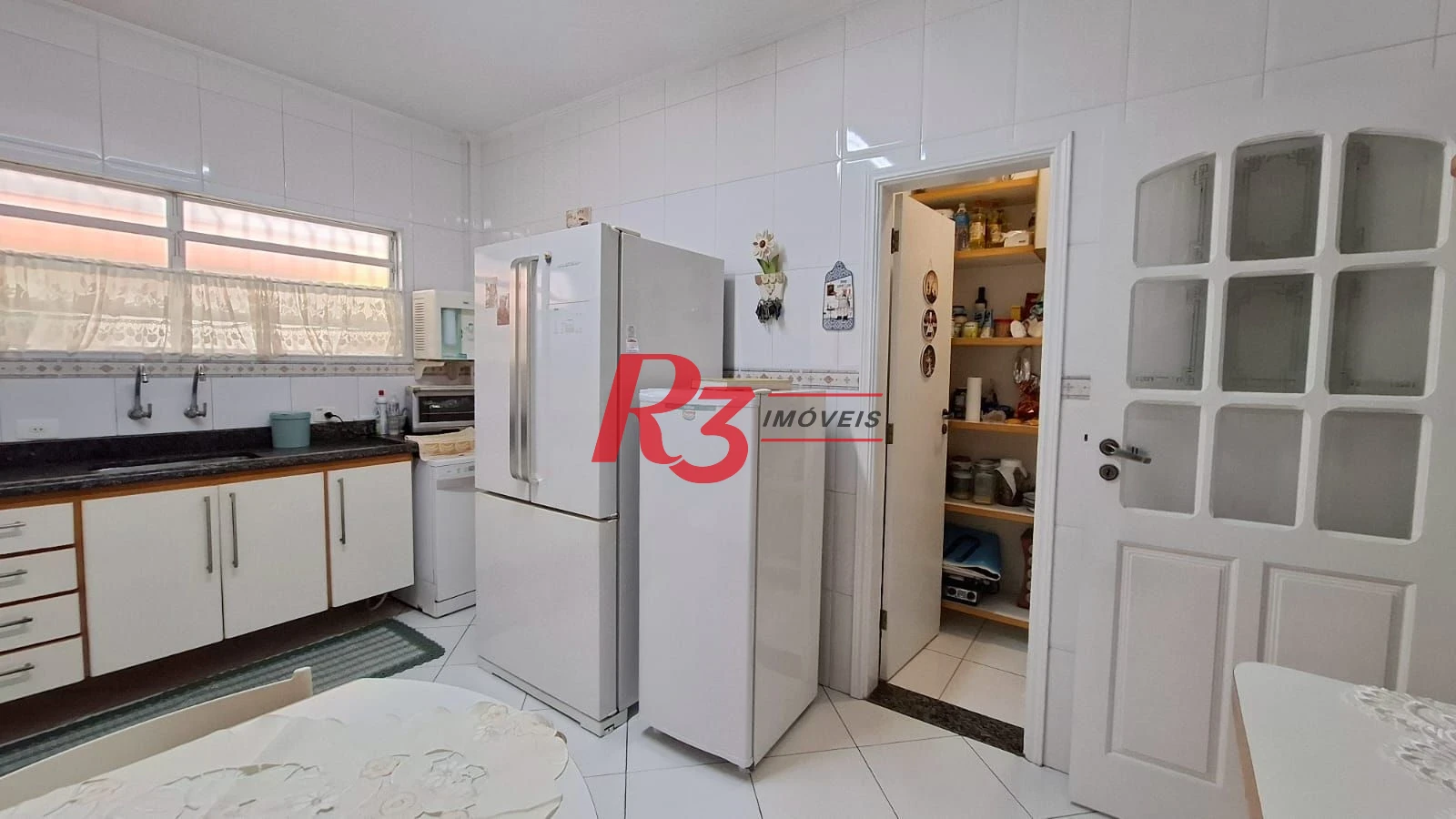 Casa com 3 dormitórios à venda, 317 m² por R$ 1.600.000,00 - Ponta da Praia - Santos/SP