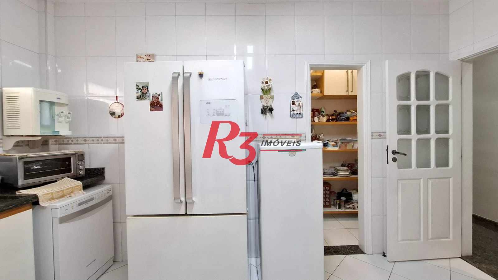 Casa com 3 dormitórios à venda, 317 m² por R$ 1.600.000,00 - Ponta da Praia - Santos/SP