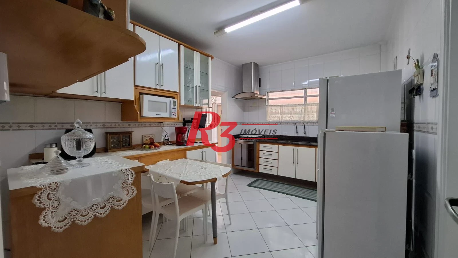Casa com 3 dormitórios à venda, 317 m² por R$ 1.600.000,00 - Ponta da Praia - Santos/SP