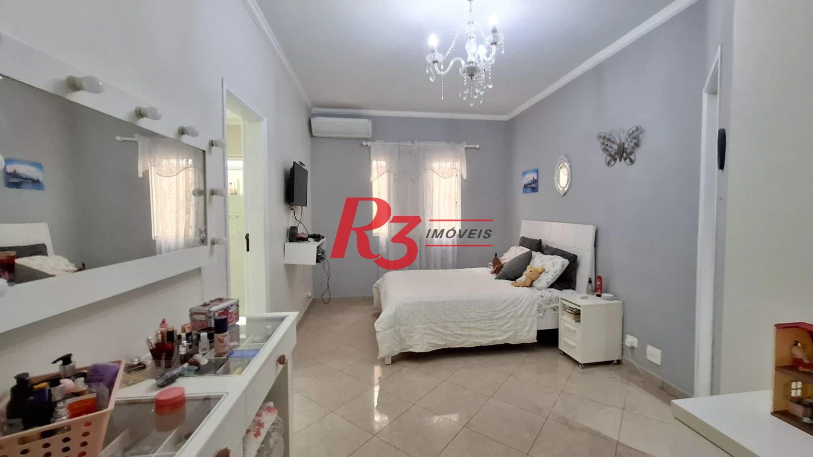 Casa com 3 dormitórios à venda, 317 m² por R$ 1.600.000,00 - Ponta da Praia - Santos/SP