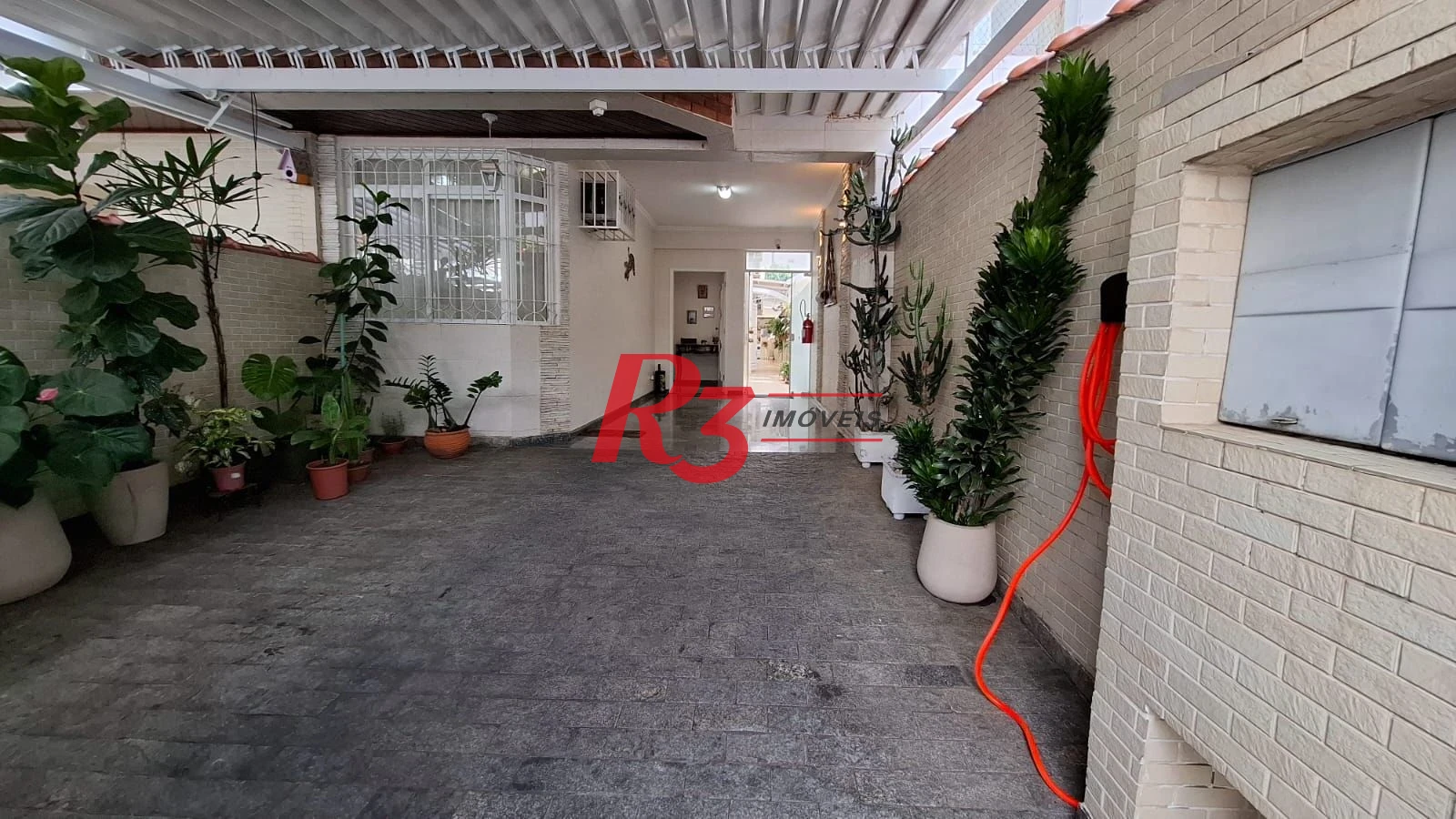 Casa com 3 dormitórios à venda, 317 m² por R$ 1.600.000,00 - Ponta da Praia - Santos/SP