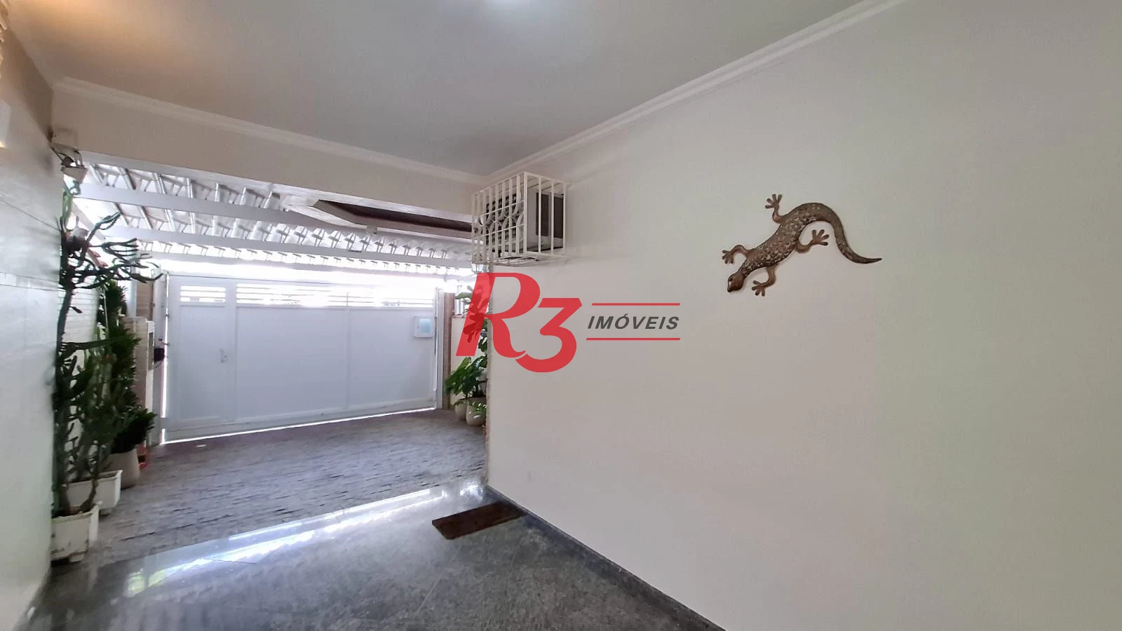 Casa com 3 dormitórios à venda, 317 m² por R$ 1.600.000,00 - Ponta da Praia - Santos/SP