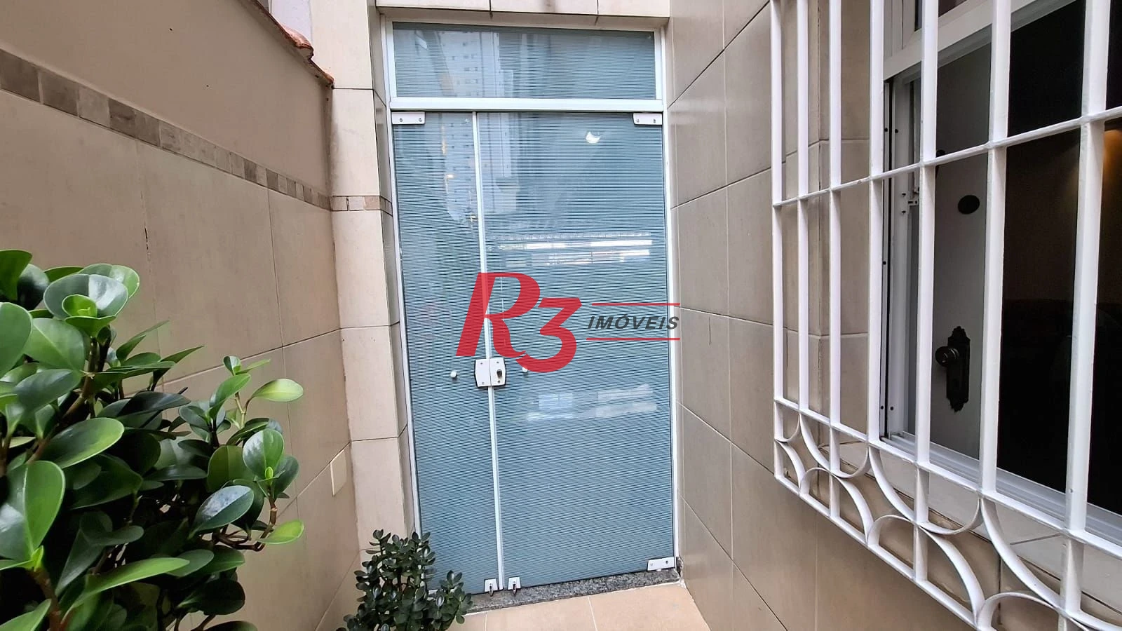 Casa com 3 dormitórios à venda, 317 m² por R$ 1.600.000,00 - Ponta da Praia - Santos/SP