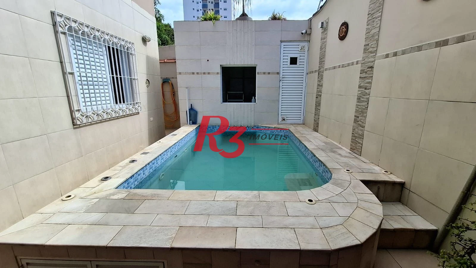 Casa com 3 dormitórios à venda, 317 m² por R$ 1.600.000,00 - Ponta da Praia - Santos/SP