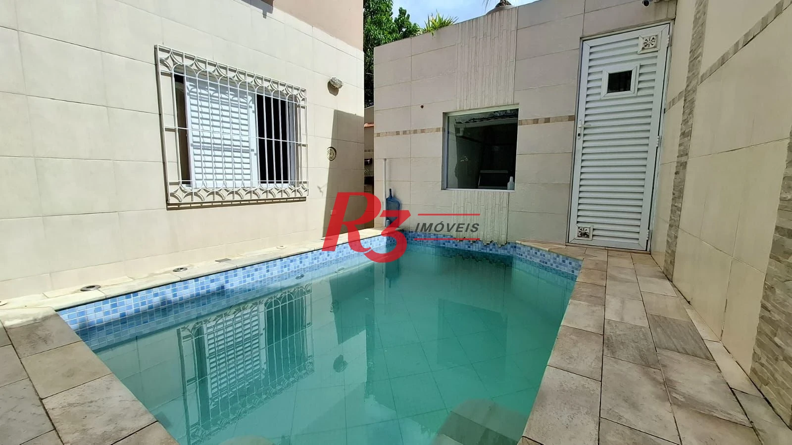 Casa com 3 dormitórios à venda, 317 m² por R$ 1.600.000,00 - Ponta da Praia - Santos/SP