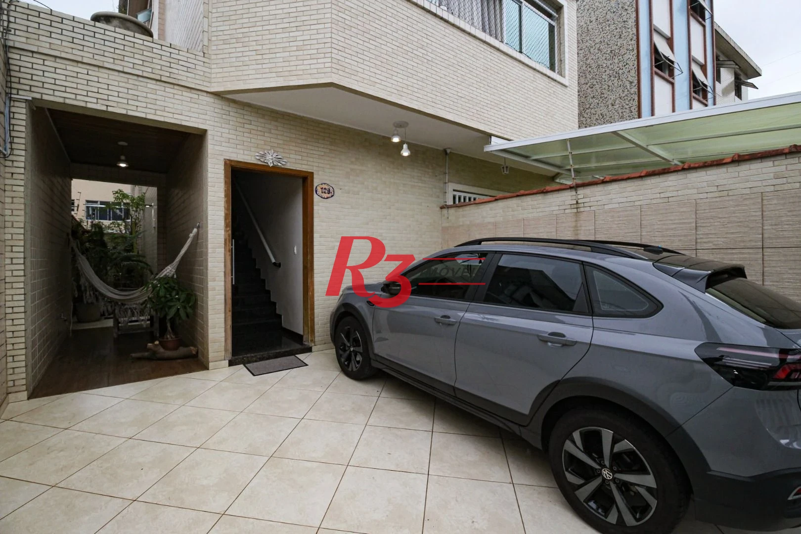 Casa com 5 dormitórios à venda, 269 m² por R$ 1.850.000,00 - Marapé - Santos/SP