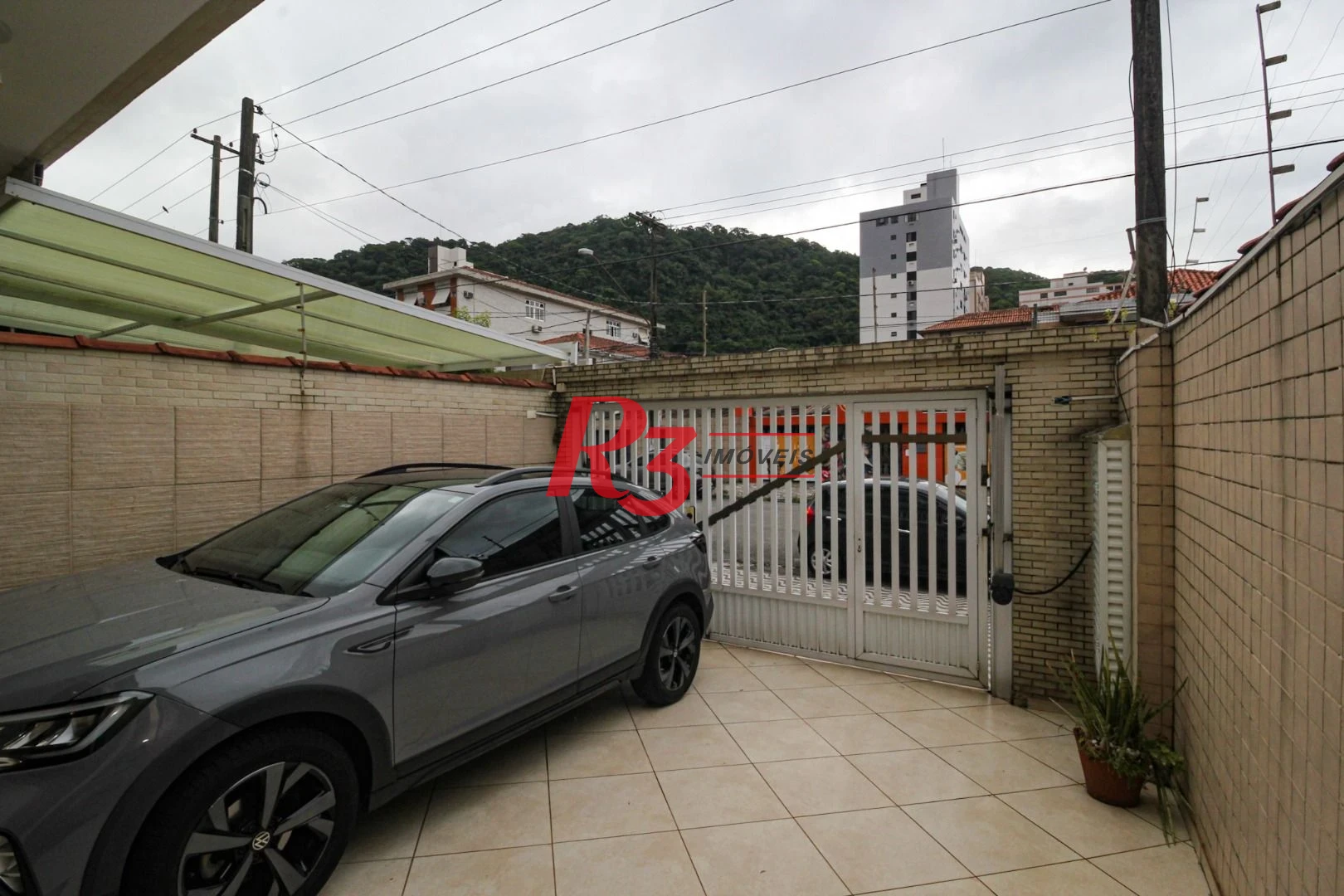 Casa com 5 dormitórios à venda, 269 m² por R$ 1.850.000,00 - Marapé - Santos/SP