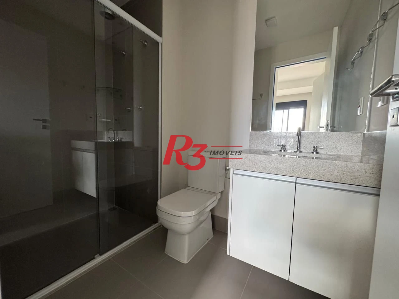 Apartamento com 1 suíte + lavabo para alugar, 54 m² por R$ 7.000/mês - Boqueirão - Santos/SP