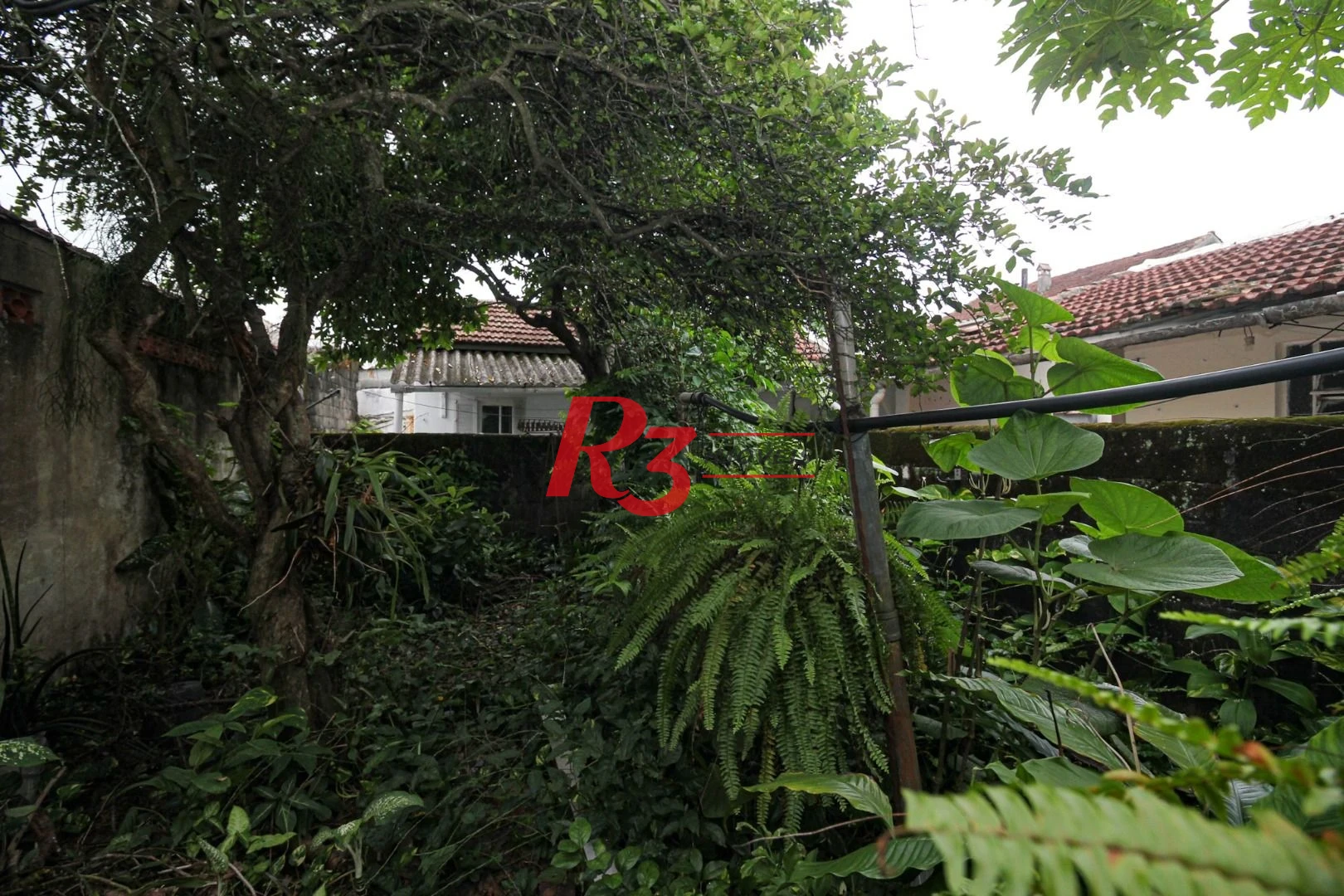 Terreno à venda, 500 m² por R$ 1.350.000,00 - Macuco - Santos/SP