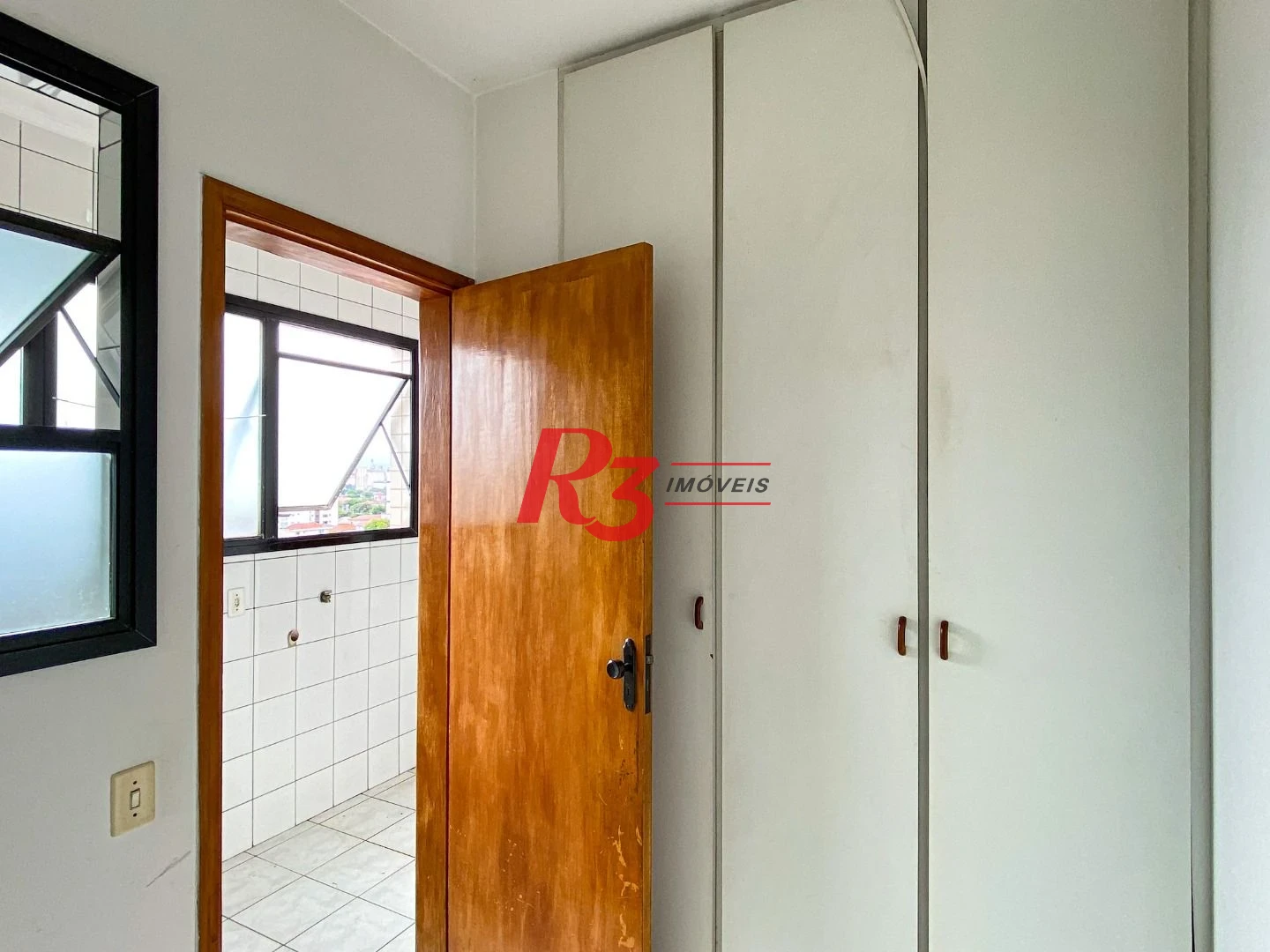 Apartamento com 2 dormitórios à venda, 111 m² por R$ 570.000,00 - Embaré - Santos/SP