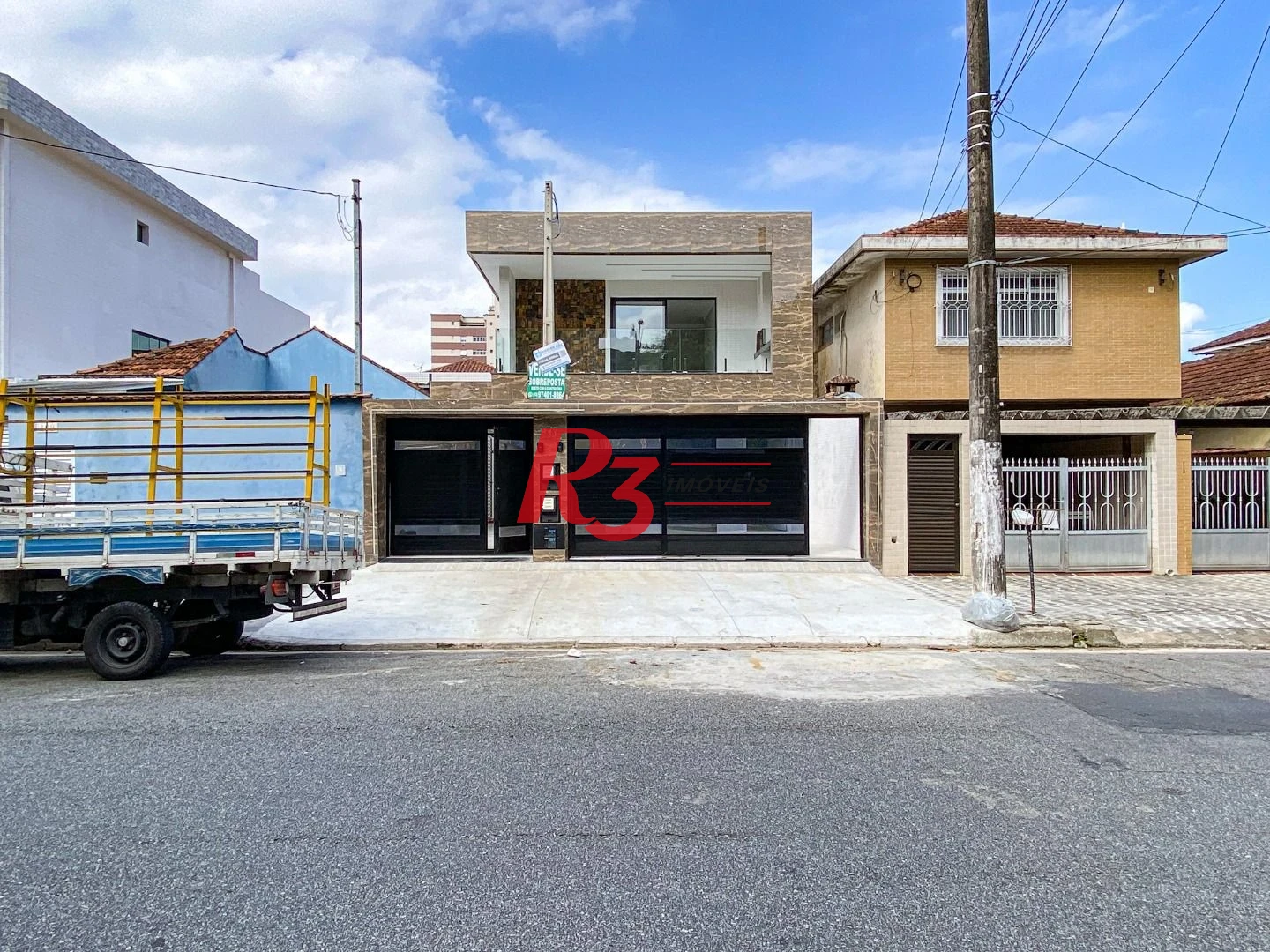Casa com 3 dormitórios à venda, 150 m² por R$ 1.040.000,00 - Marapé - Santos/SP