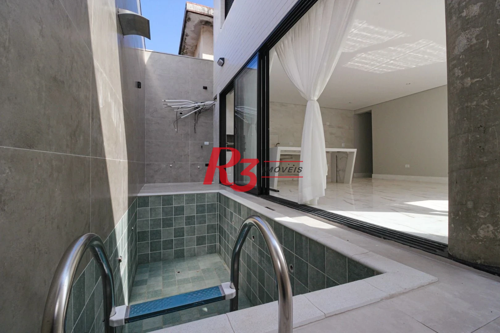 Casa com 3 dormitórios à venda, 150 m² por R$ 1.040.000,00 - Marapé - Santos/SP