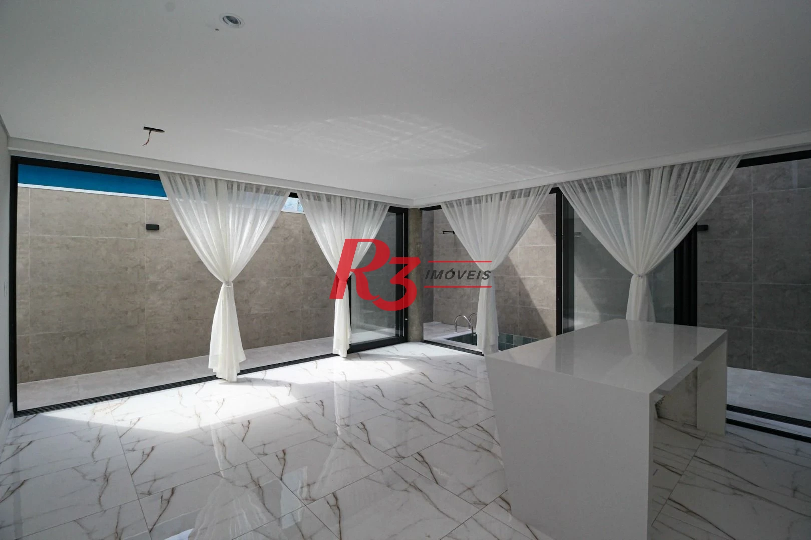 Casa com 3 dormitórios à venda, 150 m² por R$ 1.040.000,00 - Marapé - Santos/SP