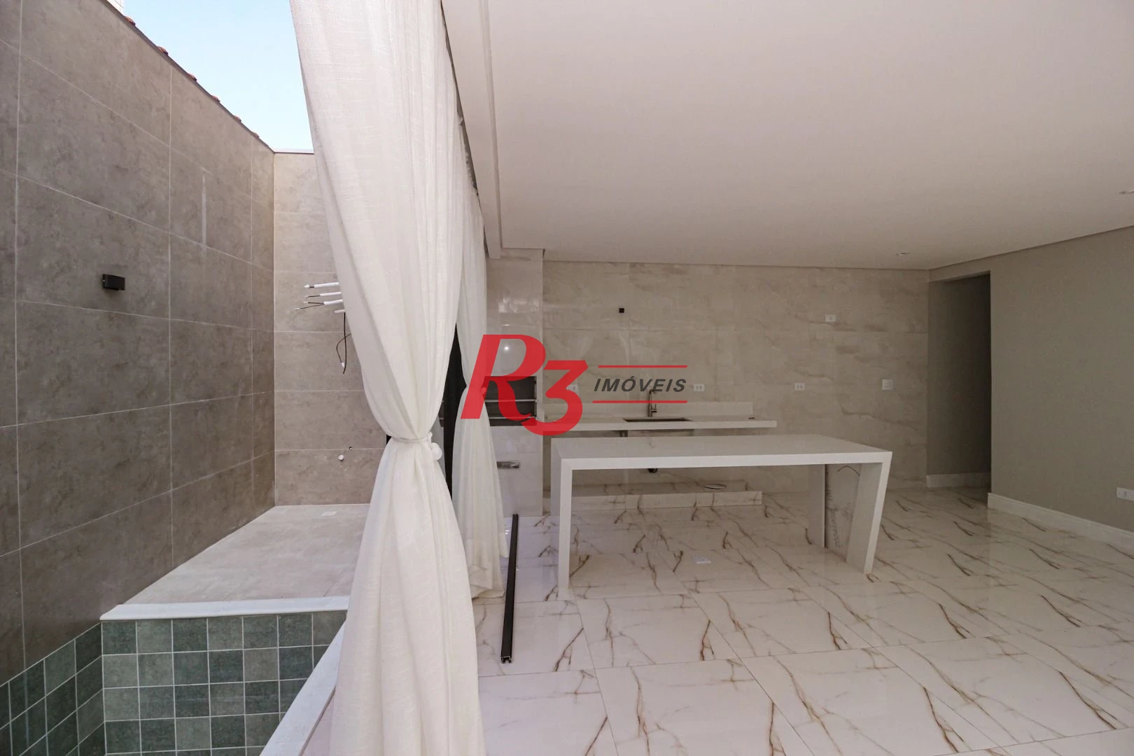Casa com 3 dormitórios à venda, 150 m² por R$ 1.040.000,00 - Marapé - Santos/SP