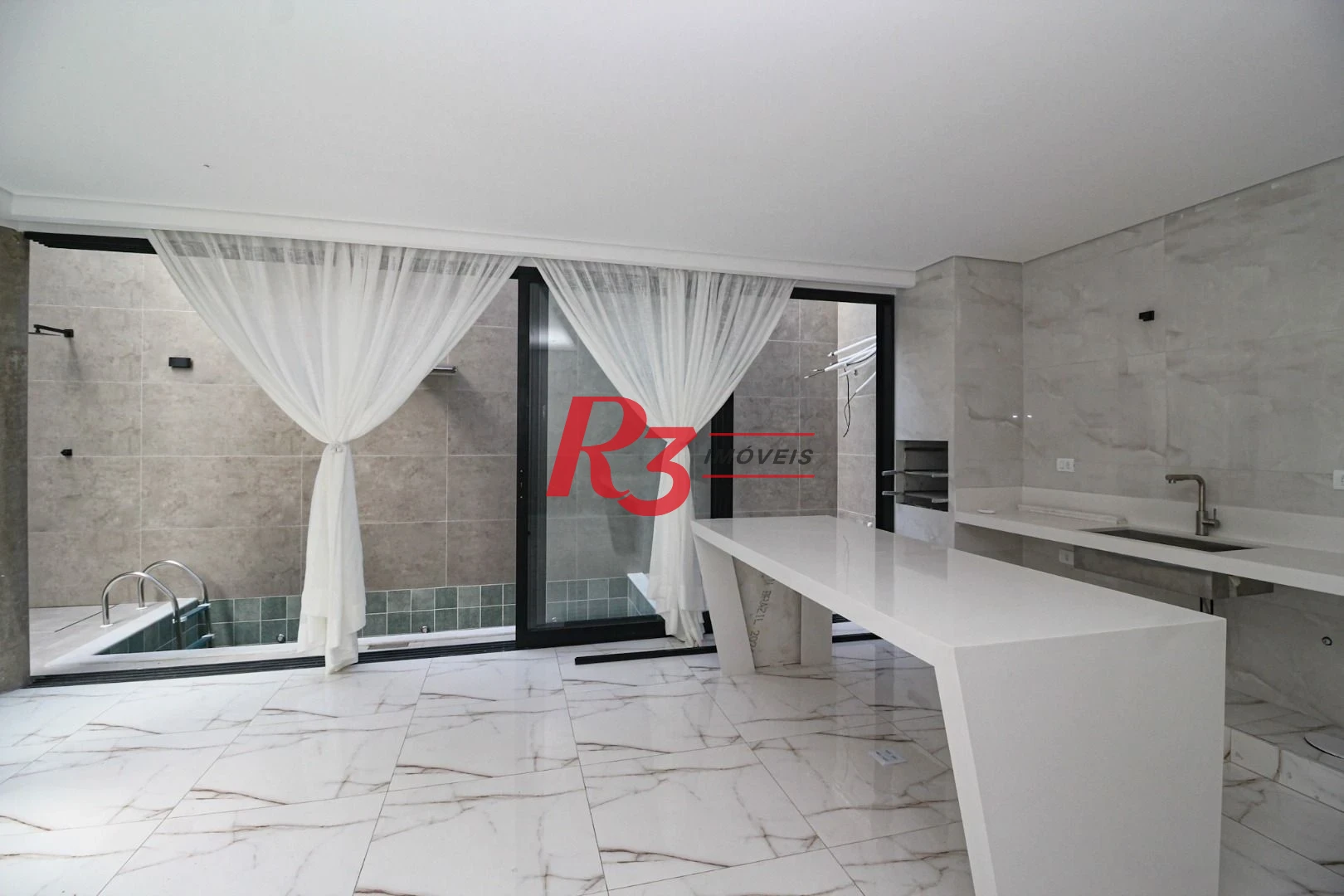 Casa com 3 dormitórios à venda, 150 m² por R$ 1.040.000,00 - Marapé - Santos/SP