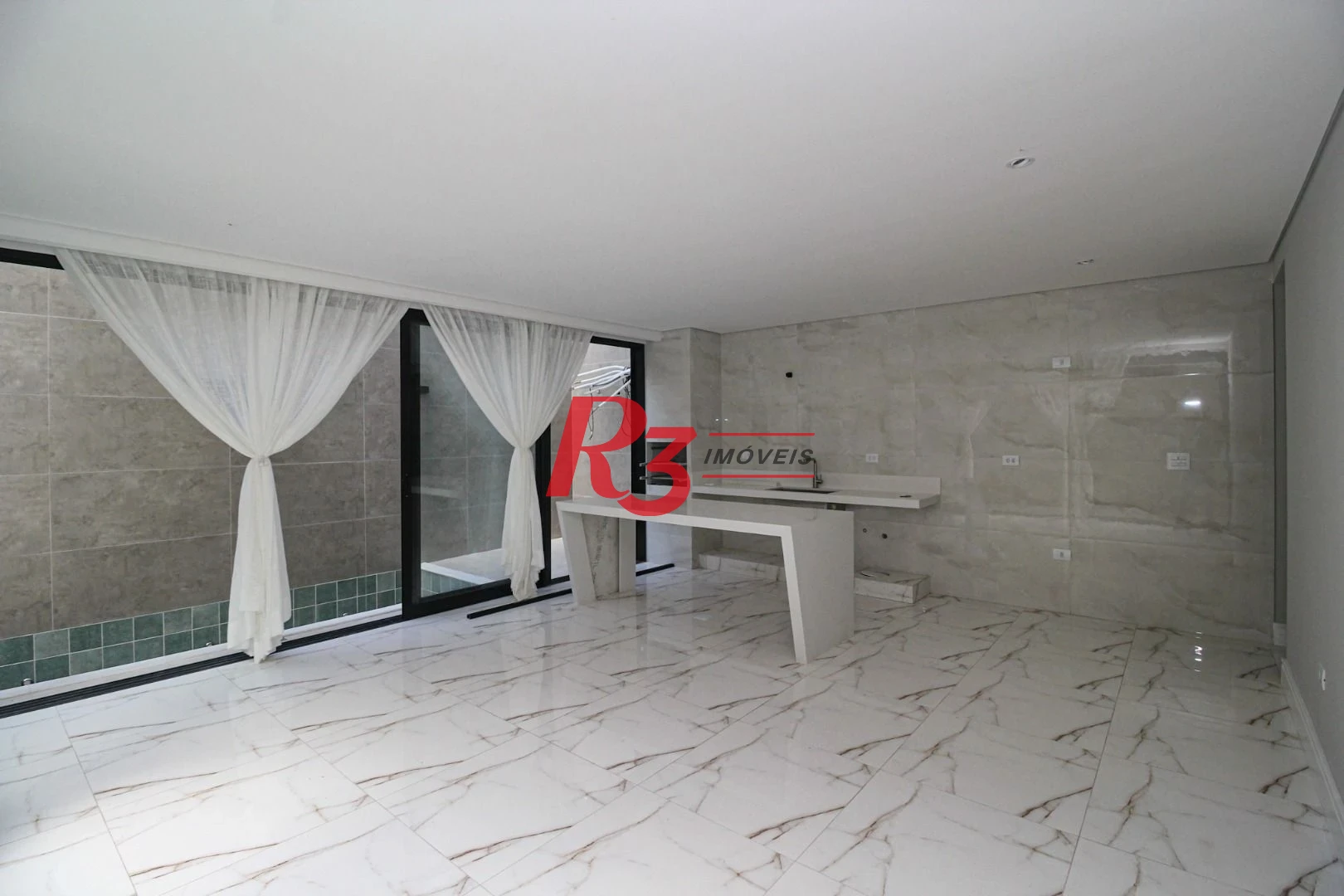 Casa com 3 dormitórios à venda, 150 m² por R$ 1.040.000,00 - Marapé - Santos/SP