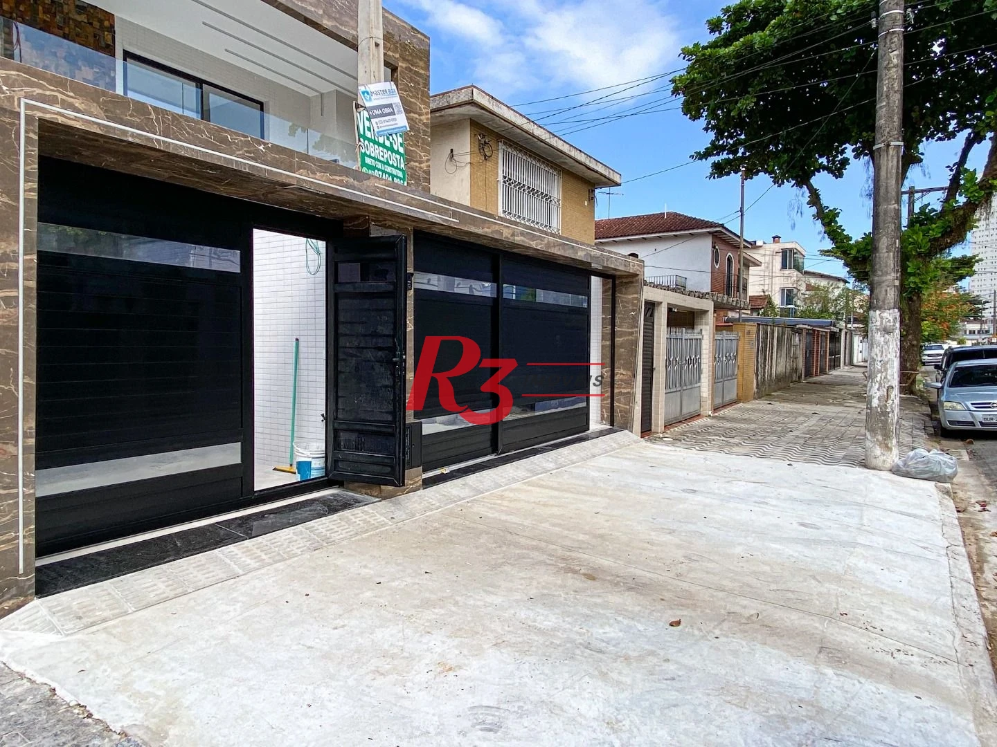 Casa com 3 dormitórios à venda, 150 m² por R$ 1.040.000,00 - Marapé - Santos/SP
