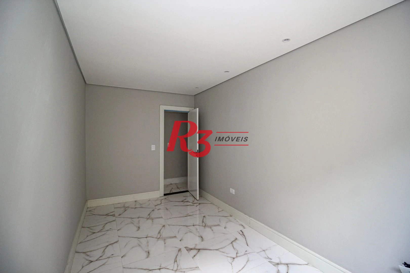Casa com 3 dormitórios à venda, 150 m² por R$ 1.040.000,00 - Marapé - Santos/SP