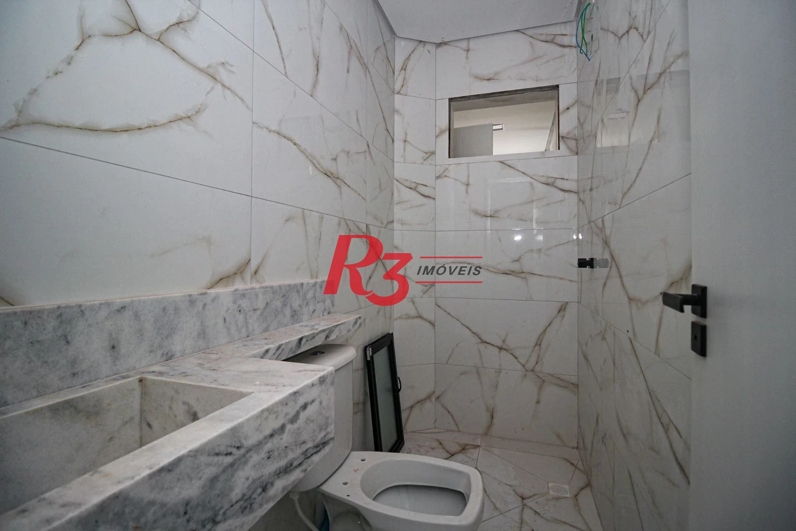 Casa com 3 dormitórios à venda, 150 m² por R$ 1.040.000,00 - Marapé - Santos/SP