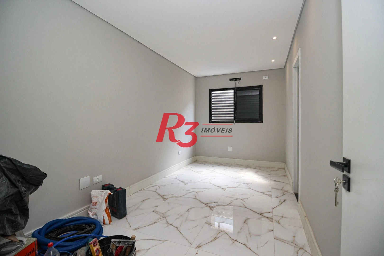 Casa com 3 dormitórios à venda, 150 m² por R$ 1.040.000,00 - Marapé - Santos/SP