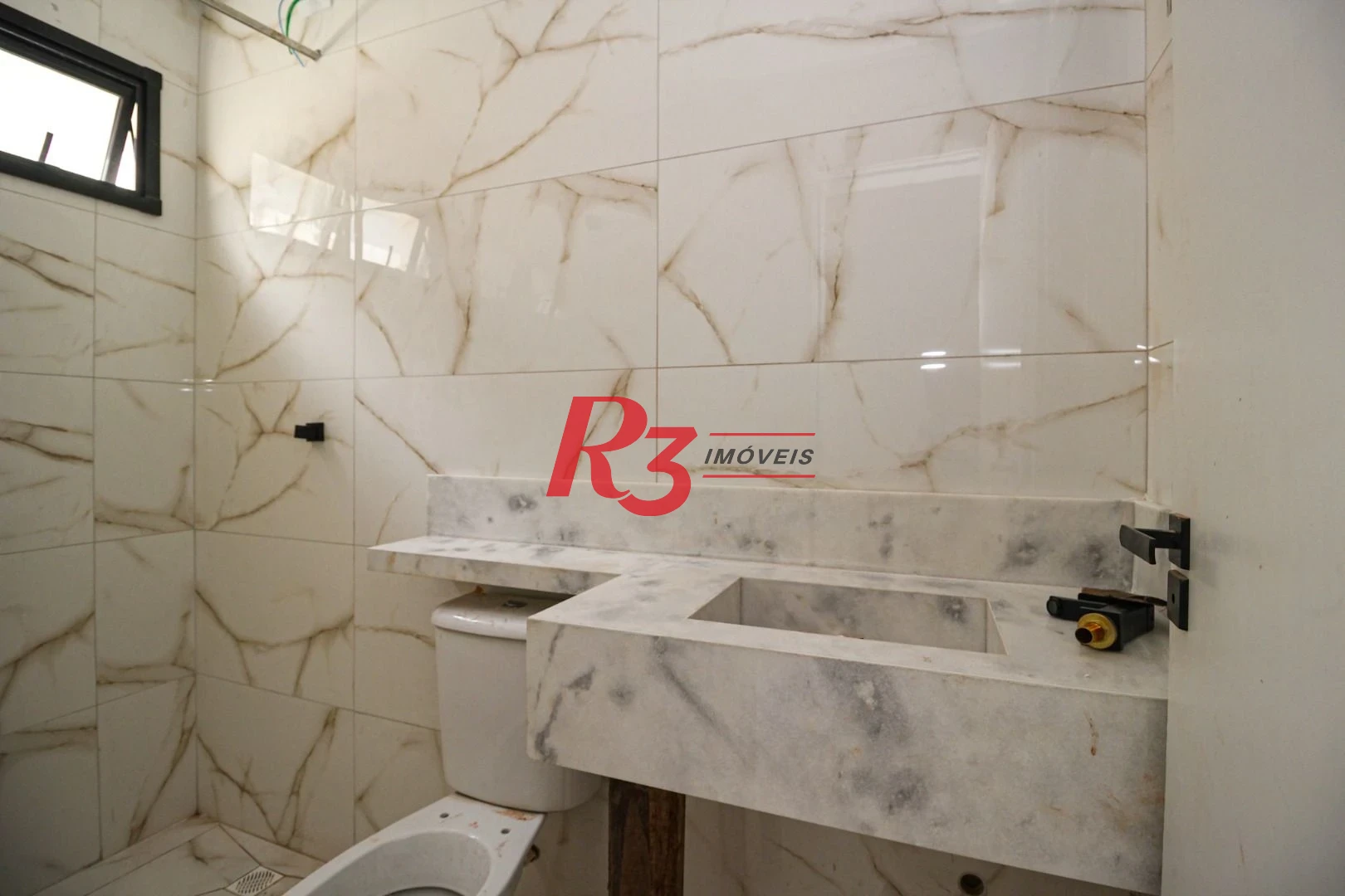 Casa com 3 dormitórios à venda, 150 m² por R$ 1.040.000,00 - Marapé - Santos/SP