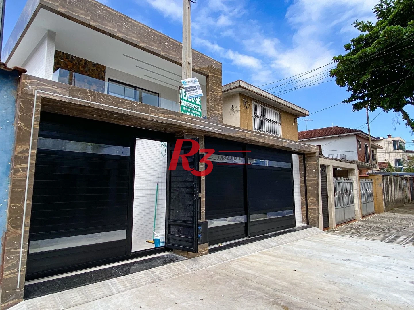 Casa com 3 dormitórios à venda, 150 m² por R$ 1.040.000,00 - Marapé - Santos/SP