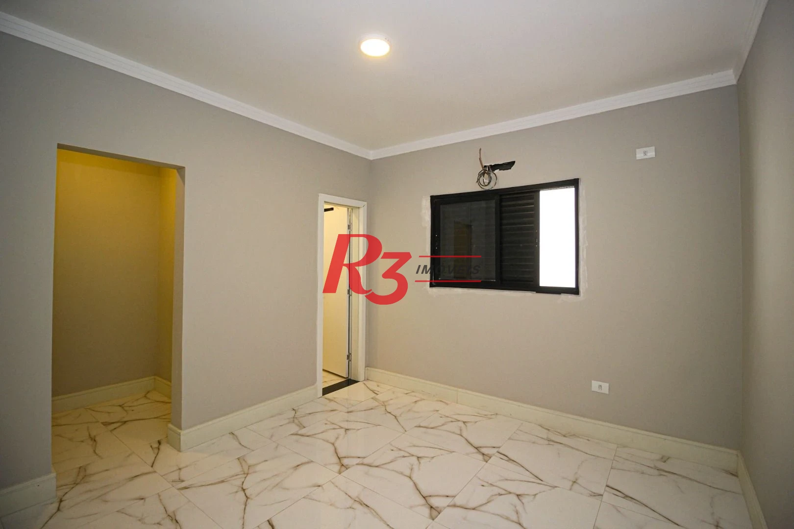 Casa com 3 dormitórios à venda, 150 m² por R$ 1.040.000,00 - Marapé - Santos/SP
