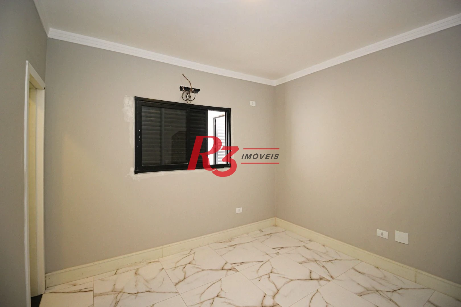 Casa com 3 dormitórios à venda, 150 m² por R$ 1.040.000,00 - Marapé - Santos/SP