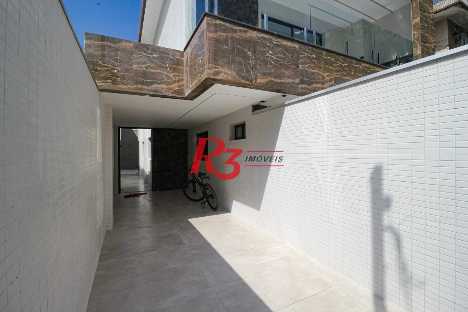 Casa com 3 dormitórios à venda, 150 m² por R$ 1.040.000,00 - Marapé - Santos/SP