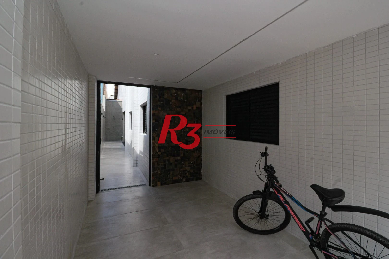 Casa com 3 dormitórios à venda, 150 m² por R$ 1.040.000,00 - Marapé - Santos/SP