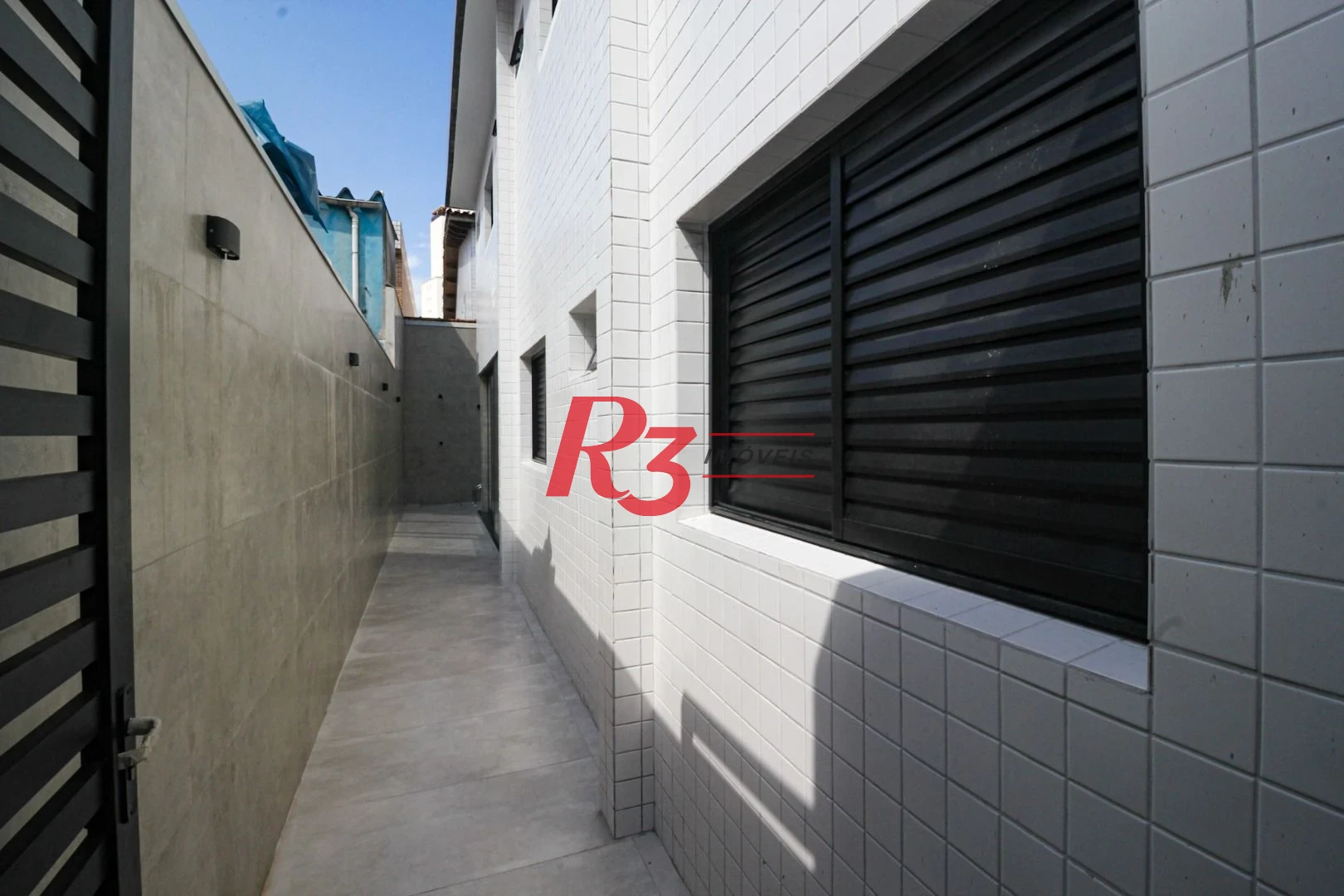 Casa com 3 dormitórios à venda, 150 m² por R$ 1.040.000,00 - Marapé - Santos/SP