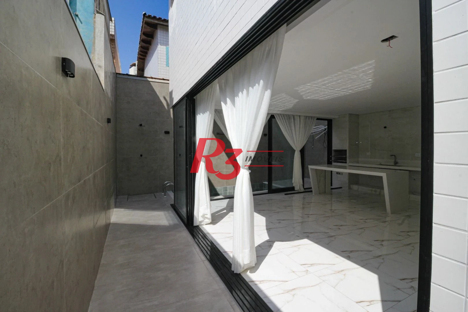 Casa com 3 dormitórios à venda, 150 m² por R$ 1.040.000,00 - Marapé - Santos/SP