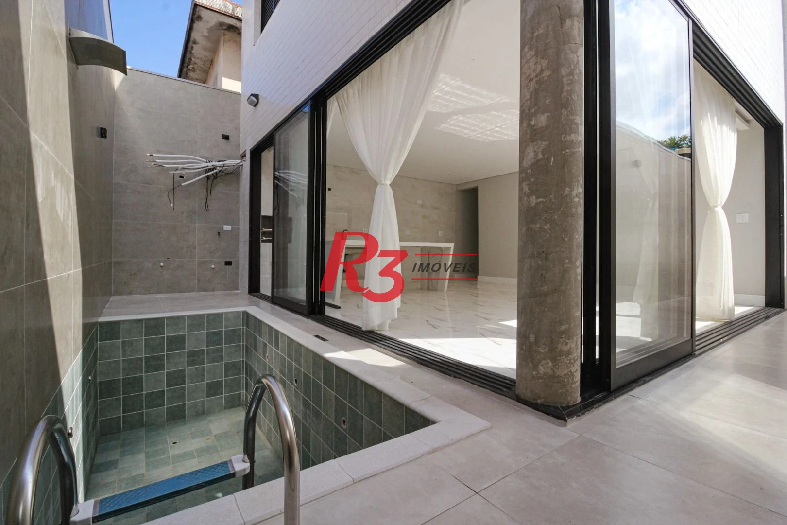 Casa com 3 dormitórios à venda, 150 m² por R$ 1.040.000,00 - Marapé - Santos/SP