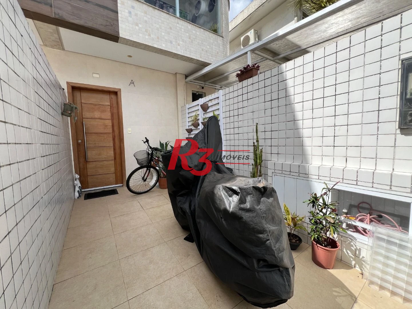 Casa com 2 dormitórios à venda, 80 m² por R$ 860.000,00 - Embaré - Santos/SP