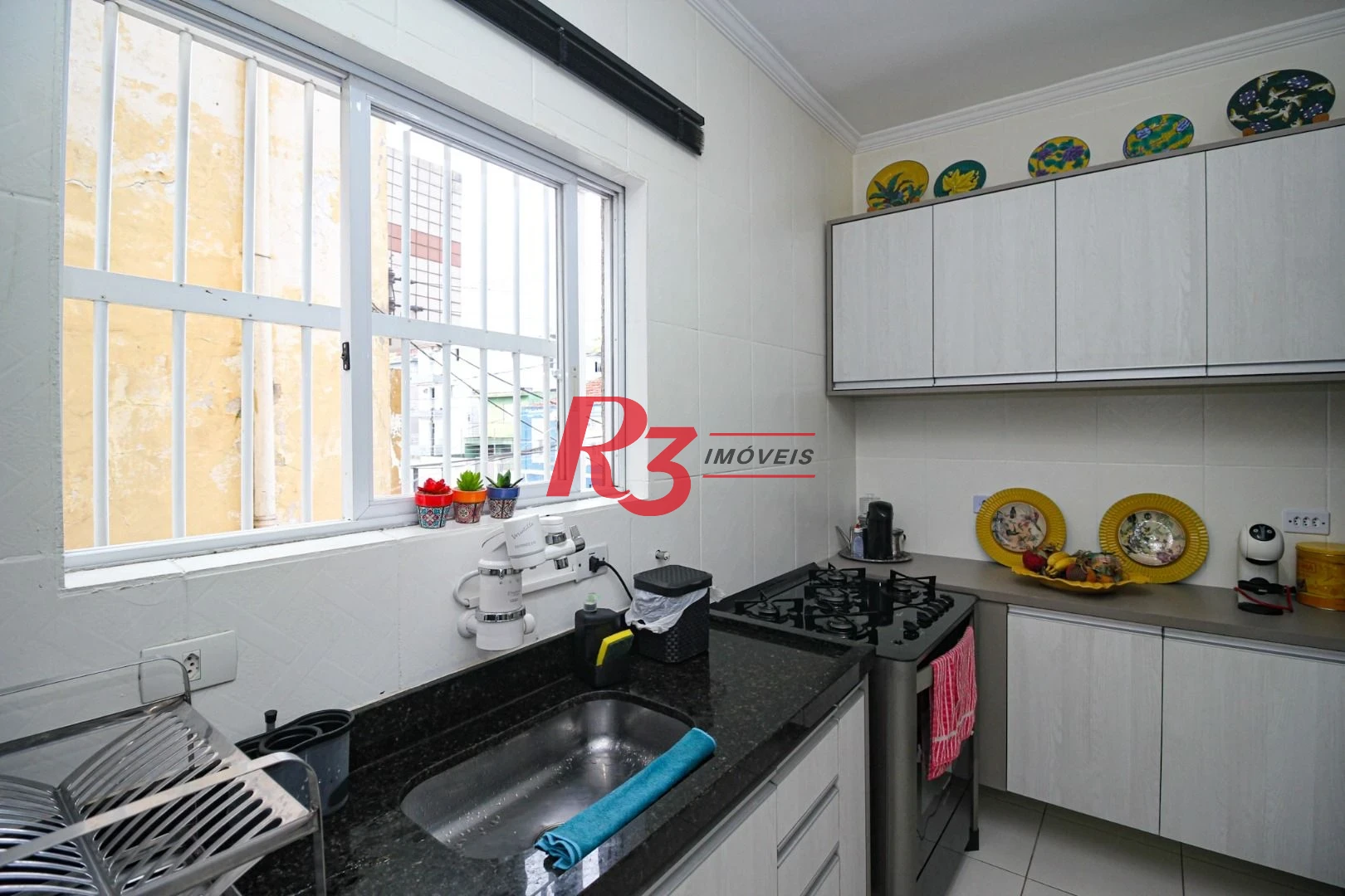 Sobrado com 2 dormitórios à venda, 115 m² por R$ 560.000,00 - Vila Matias - Santos/SP