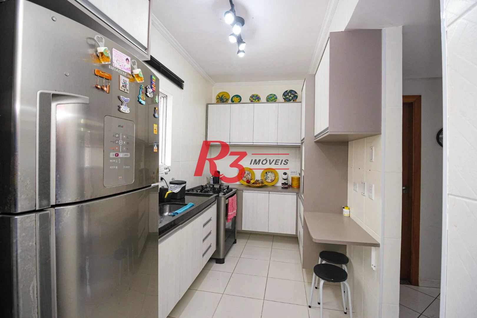 Sobrado com 2 dormitórios à venda, 115 m² por R$ 560.000,00 - Vila Matias - Santos/SP