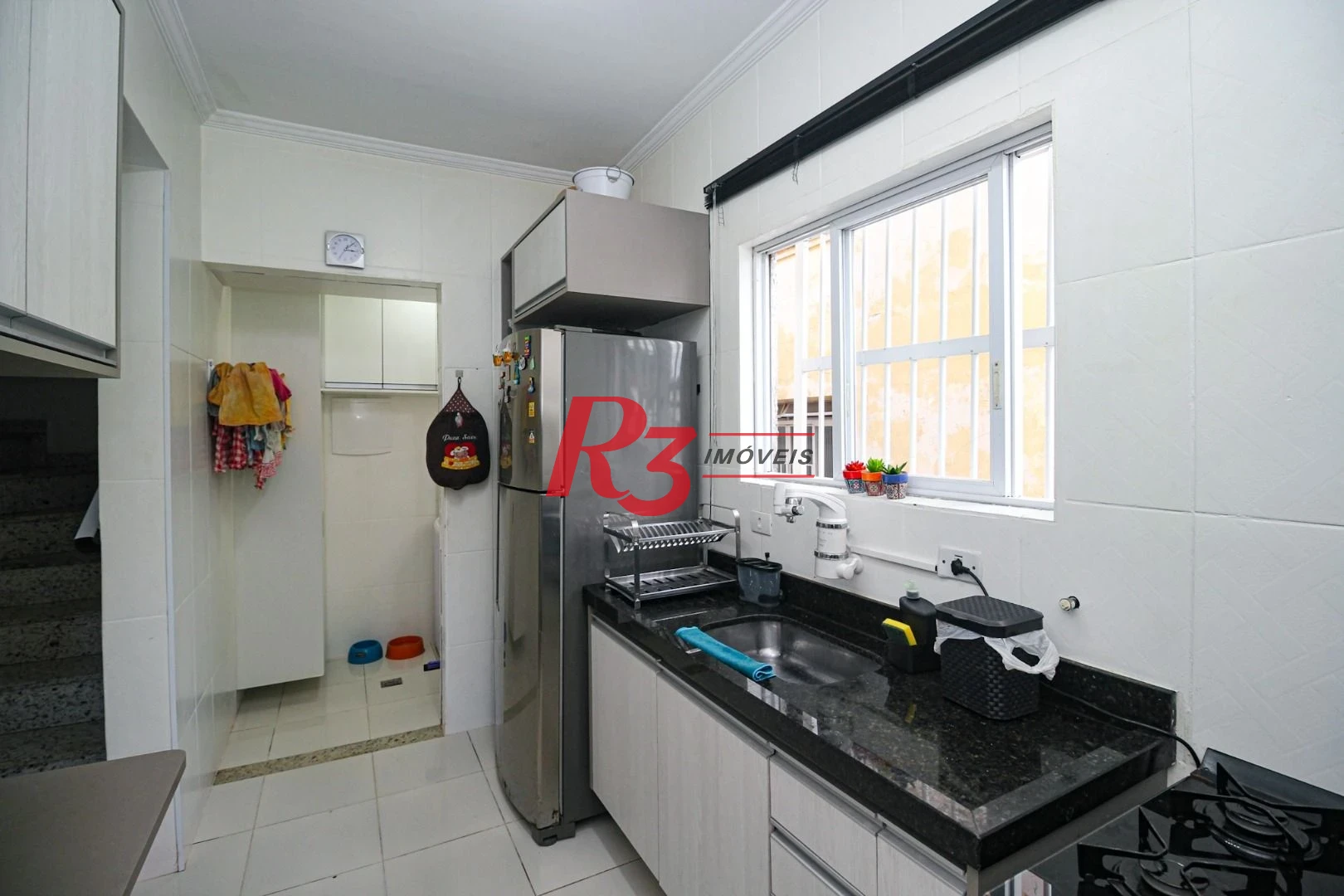 Sobrado com 2 dormitórios à venda, 115 m² por R$ 560.000,00 - Vila Matias - Santos/SP