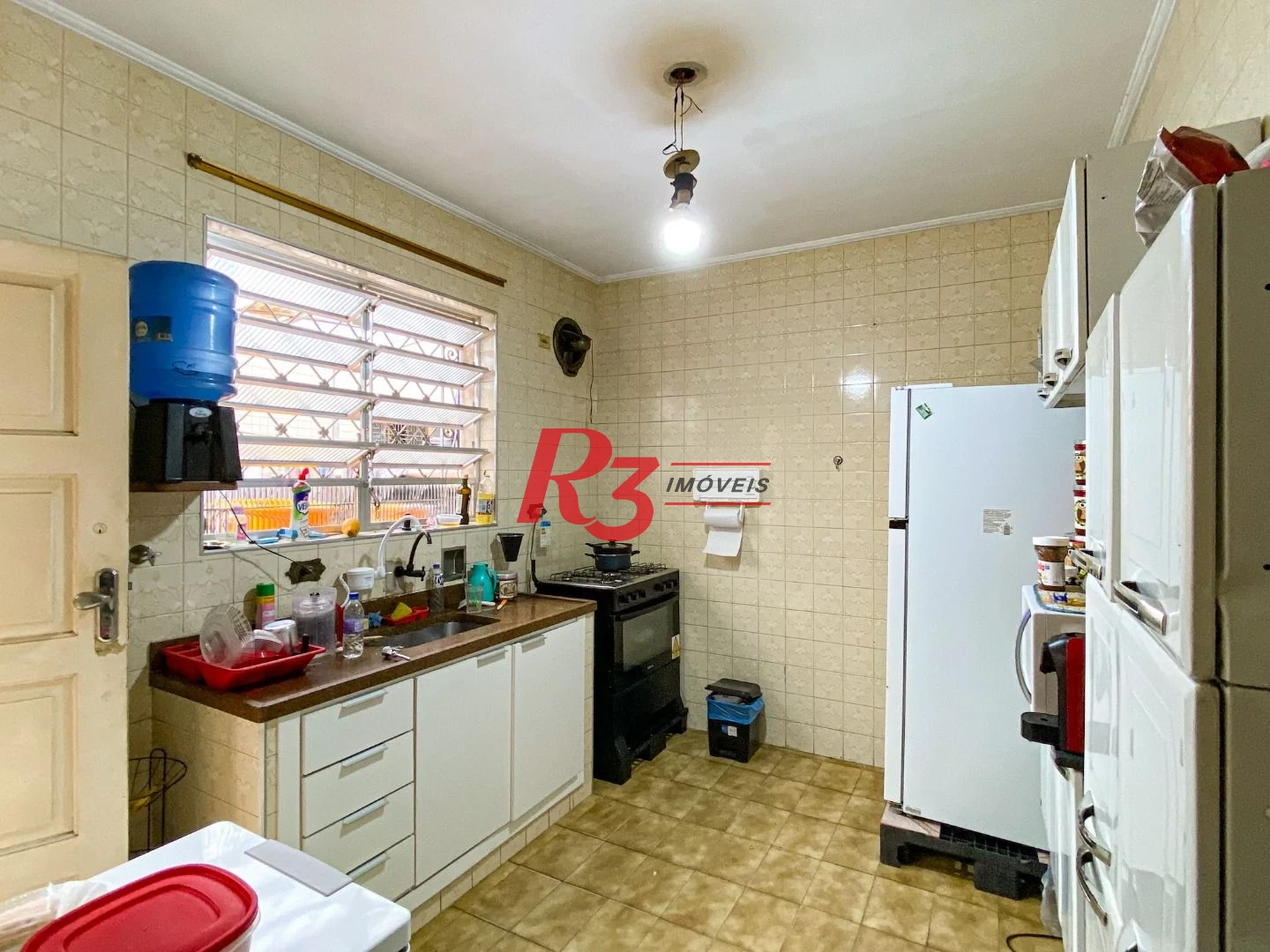 Sobrado com 2 dormitórios à venda, 84 m² por R$ 440.000,00 - Vila Matias - Santos/SP