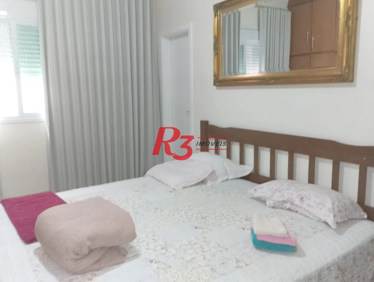 Sobrado com 3 dormitórios à venda, 180 m² por R$ 2.100.000,00 - Gonzaga - Santos/SP