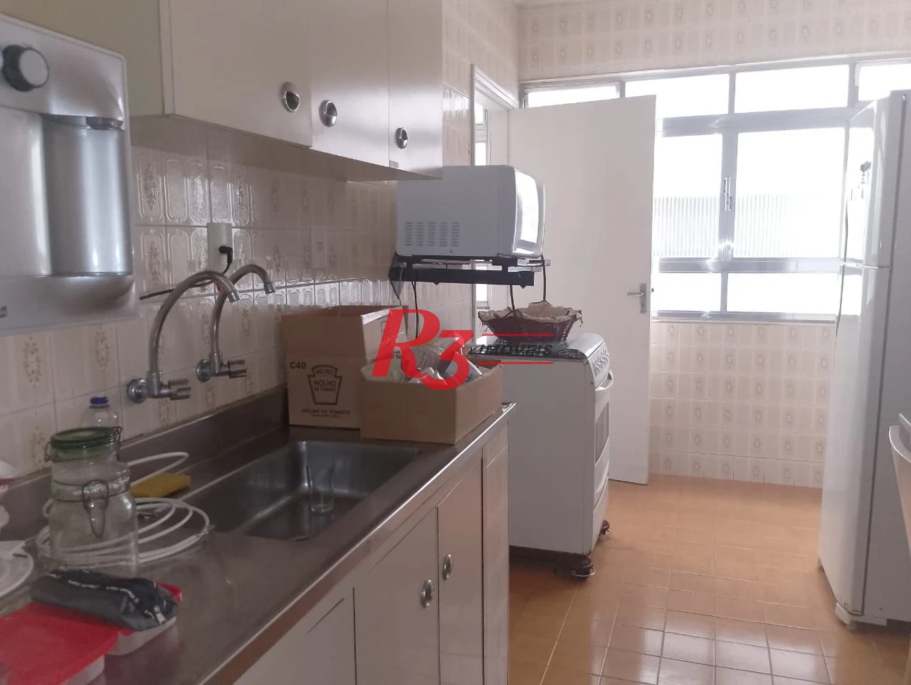 Apartamento com 2 dormitórios à venda, 98 m² por R$ 550.000,00 - Gonzaga - Santos/SP