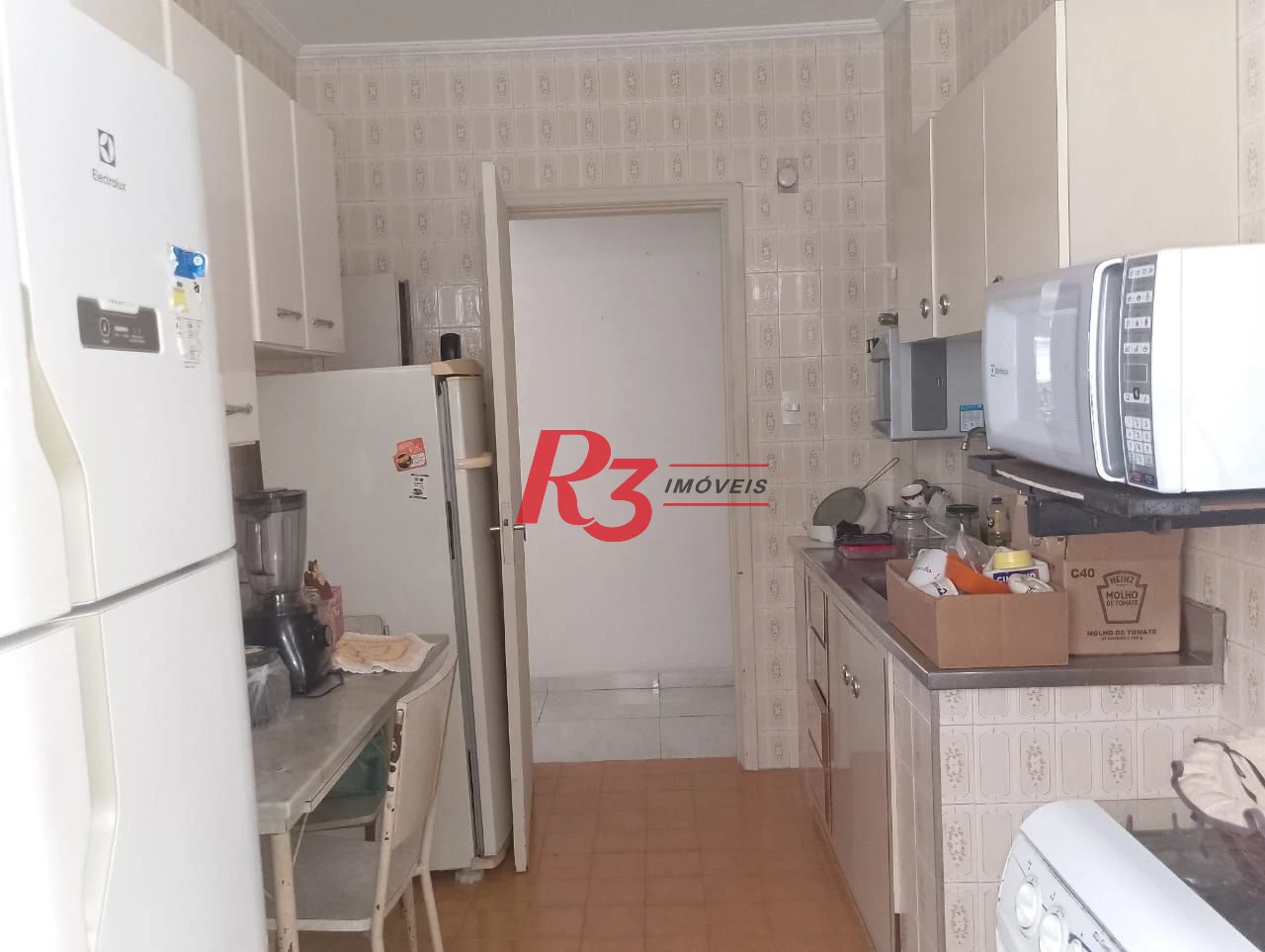Apartamento com 2 dormitórios à venda, 98 m² por R$ 550.000,00 - Gonzaga - Santos/SP